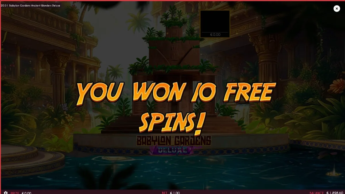 Tampilan layar permainan slot Babylon Gardens Ancient Wonders Deluxe dengan latar belakang taman gantung dan arsitektur kuno.
